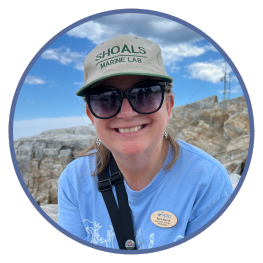 Sara Morris wearing Shoals Marine Lab baseball hat and sunglasses.